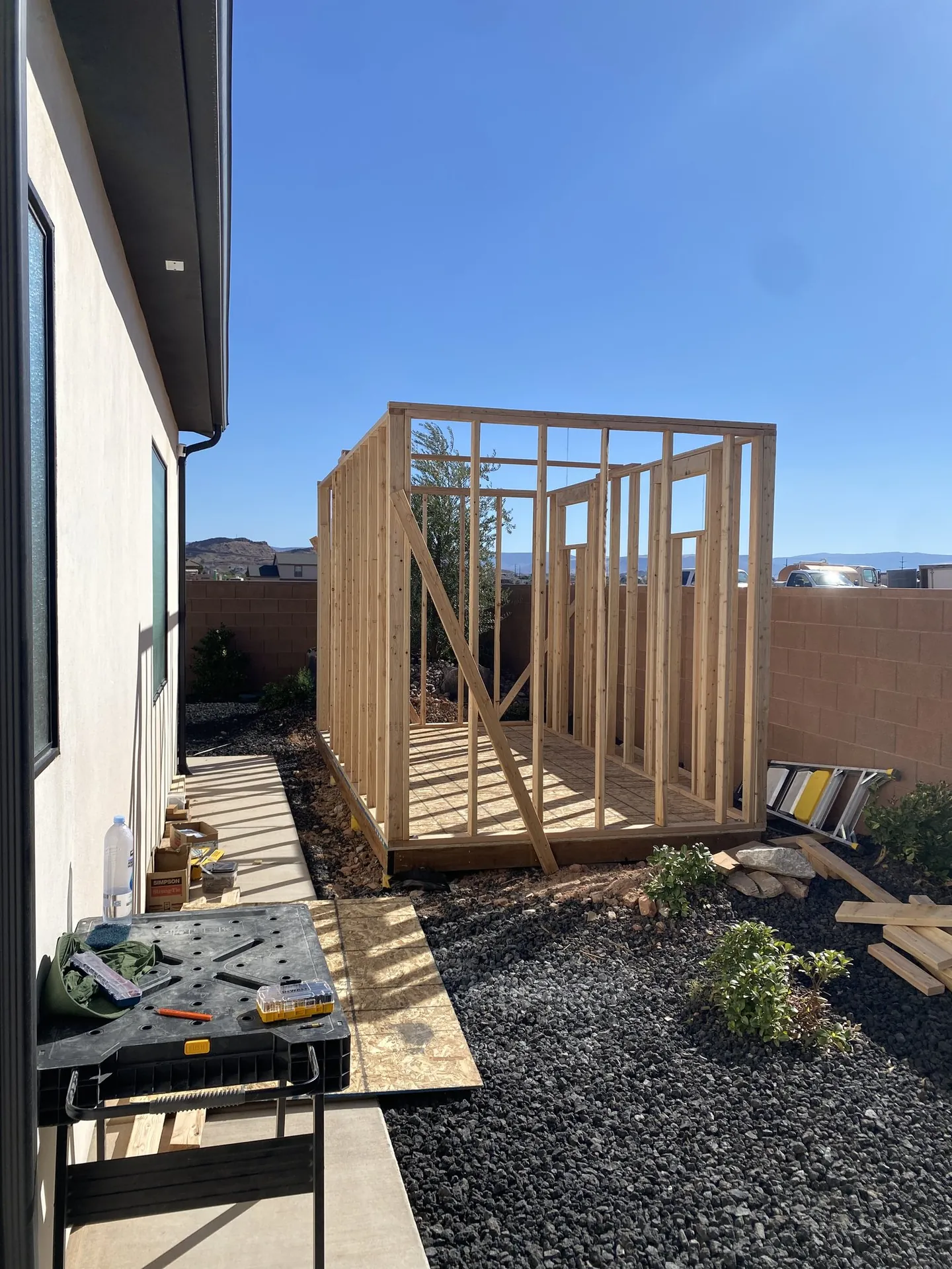 All four shed walls framed with the roof still open to the sky