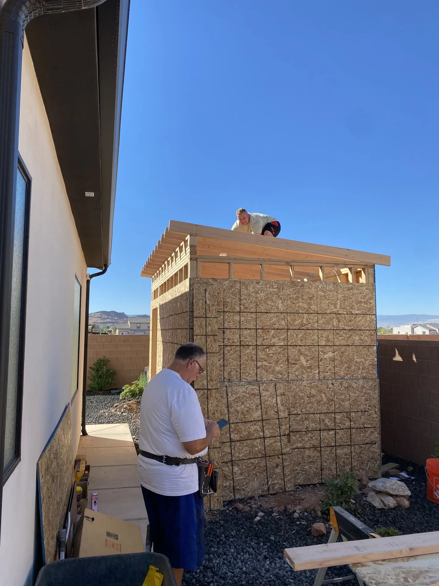 Viking Solutions crew working on the shed roof framing together