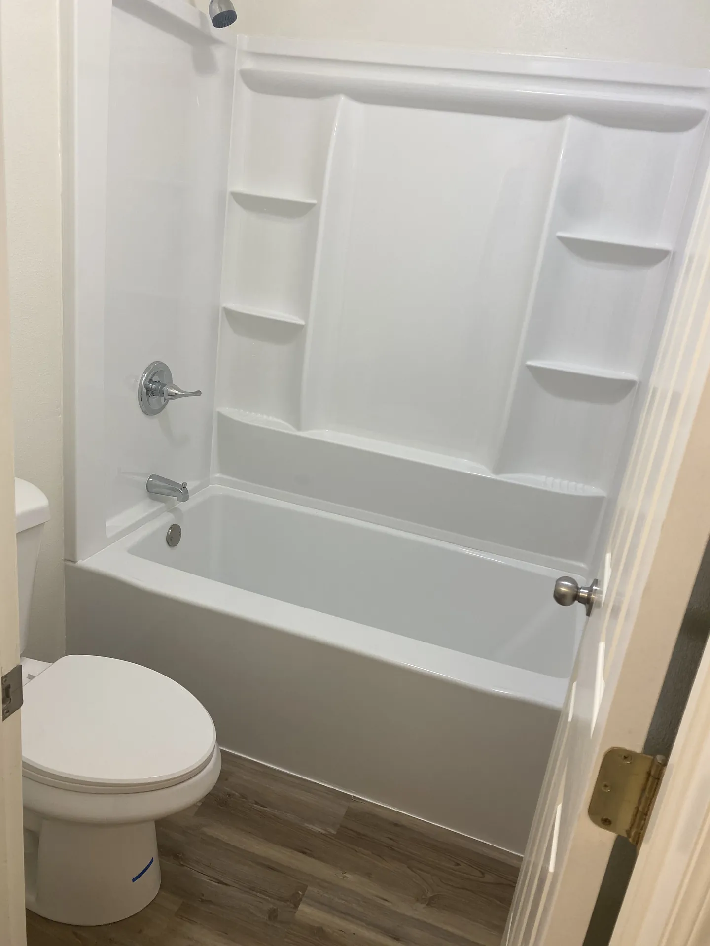 Refreshed bathroom with new fixtures after the apartment remodel