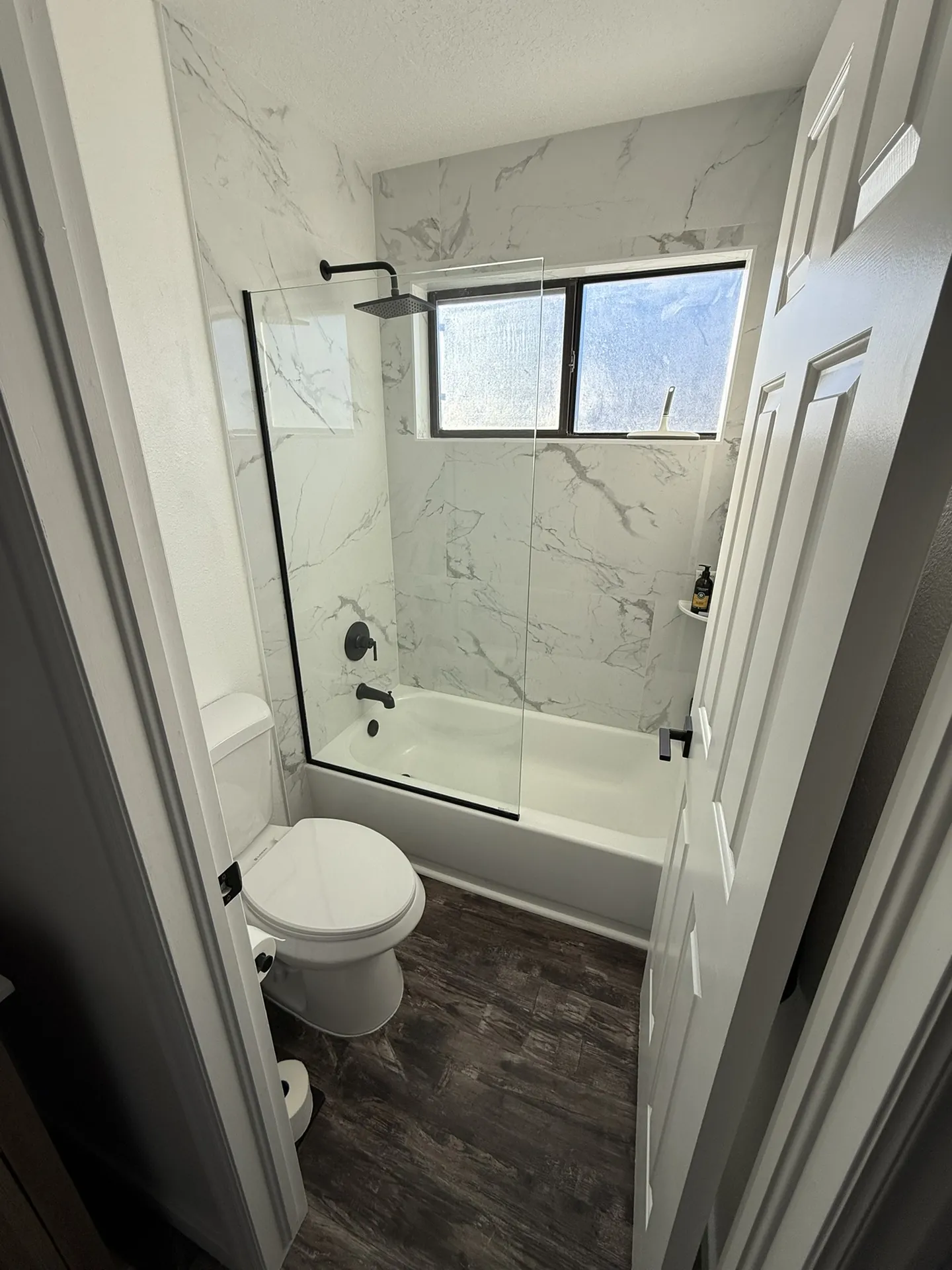 New shower tile in the remodeled hall bathroom