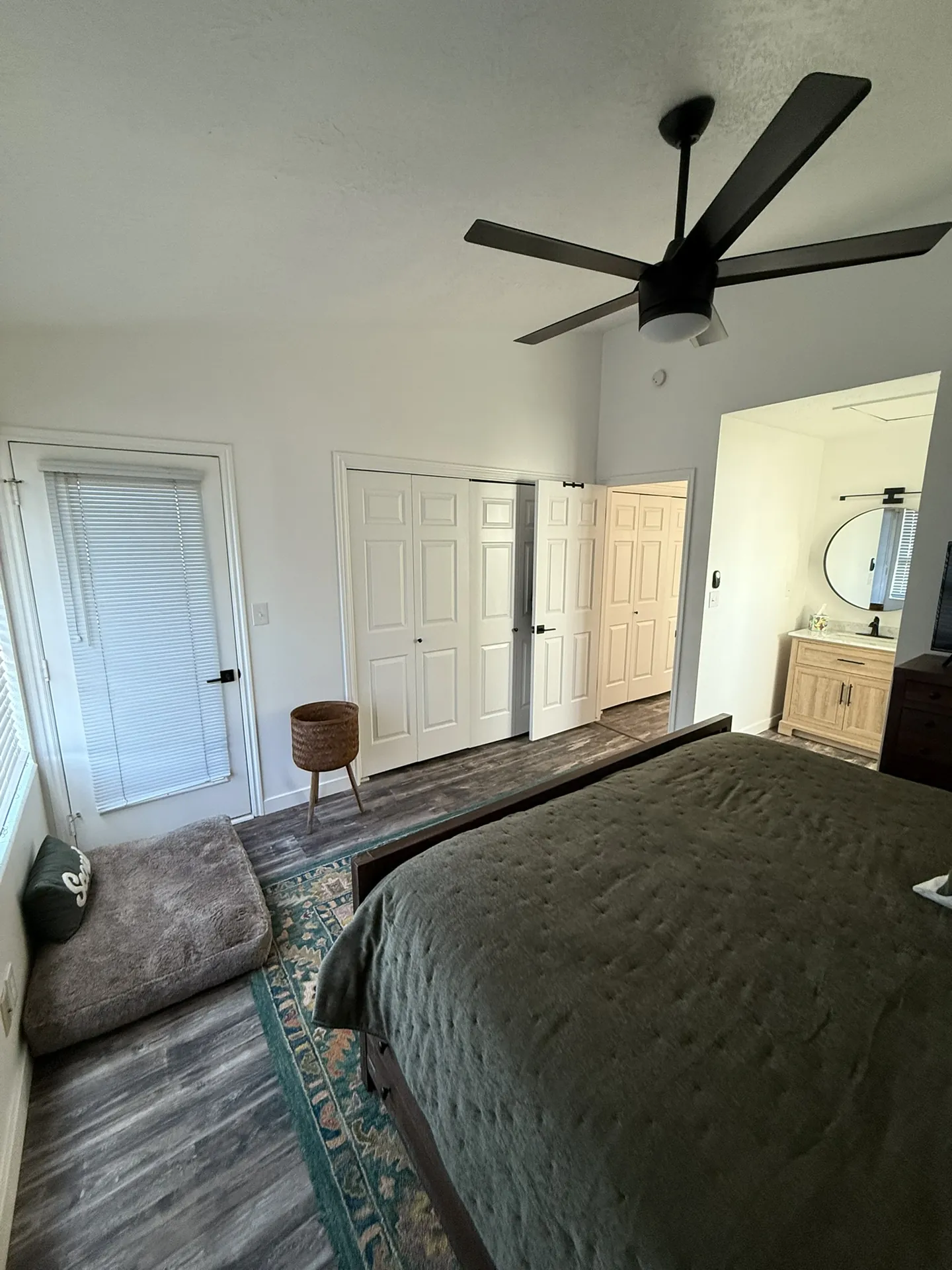 Finished master bedroom with new flooring and fresh finishes and the view window kept clear