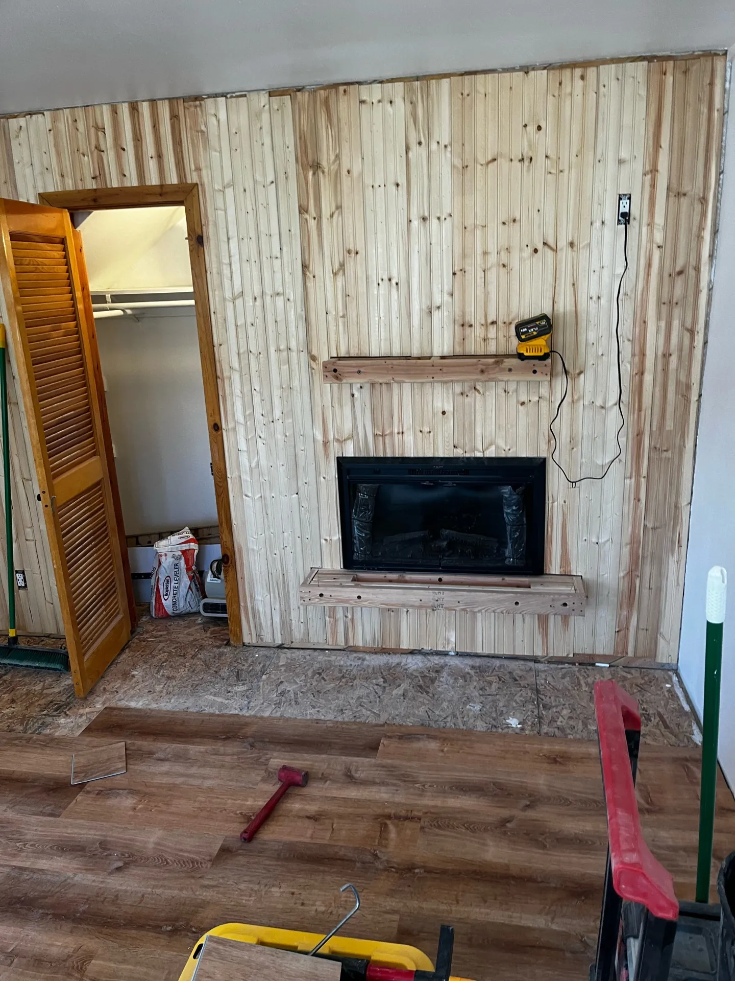 Finished living area of the Brian Head studio with new flooring and repainted walls