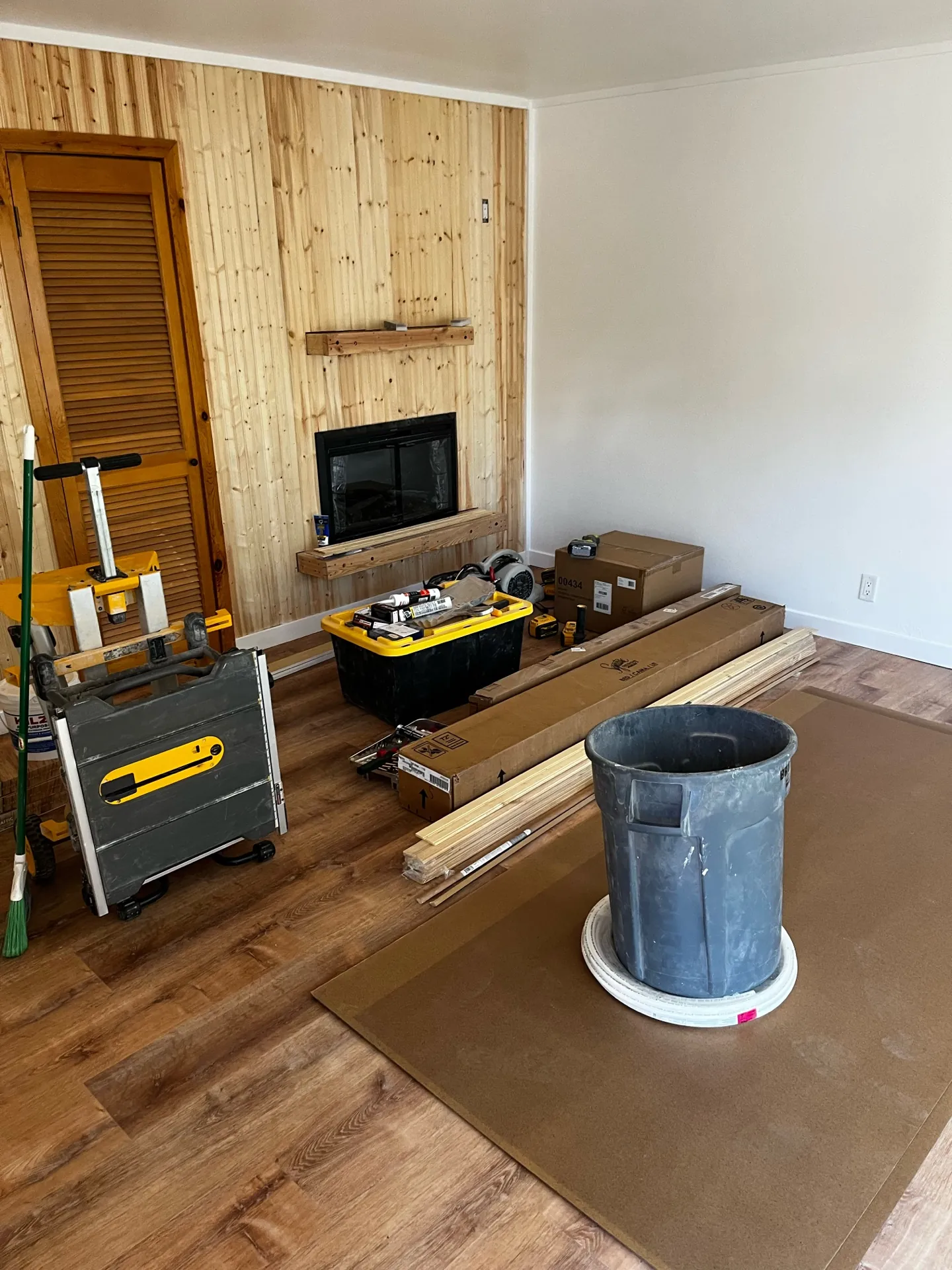 Another finished view of the remodeled studio showing consistent flooring and paint