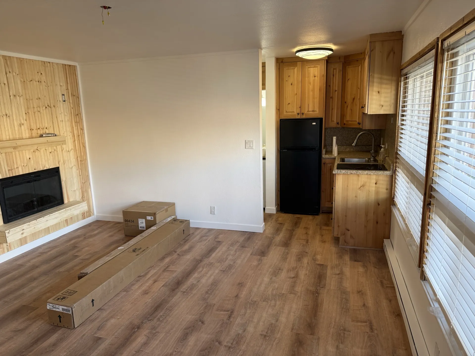 Studio kitchen area in its original condition before the remodel