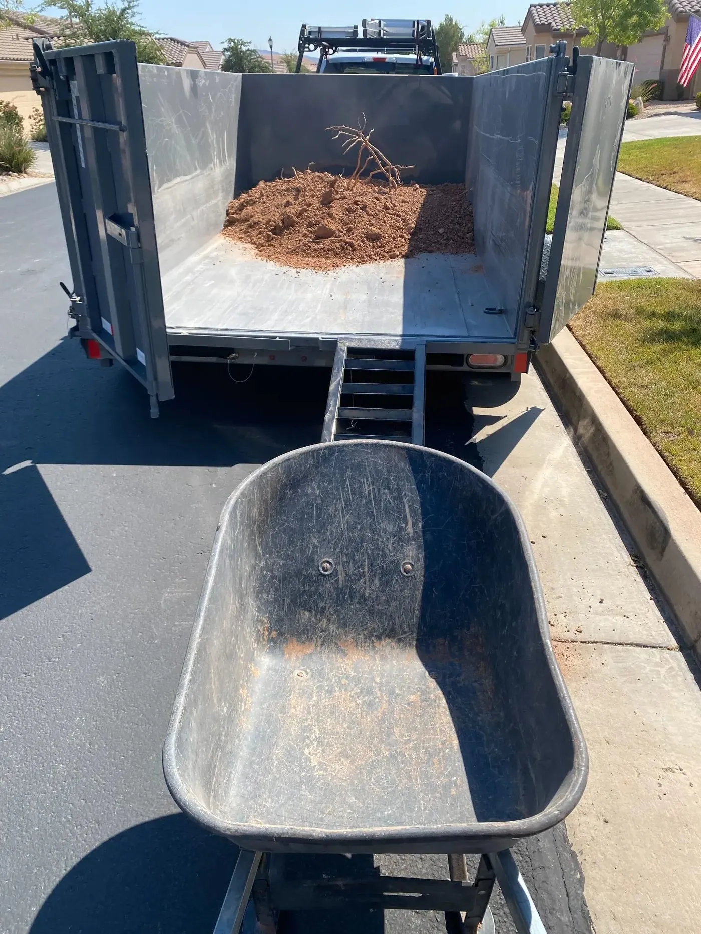 Excavated gravel and dirt loaded on a trailer for haul-off